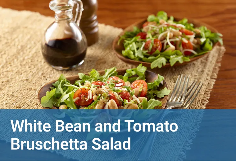 Healthcare career school Ultimate Medical Academy's graphic of a white bean and tomato bruschetta salad on a table, next to a spoon